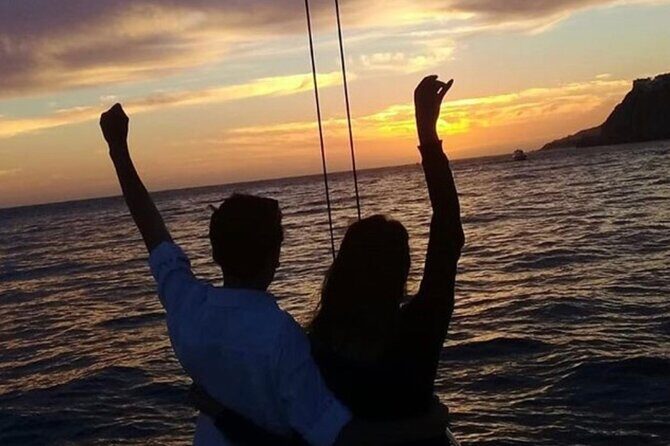 2 Hour Sunset Tour on Catamaran in Cabo San Lucas - Medano Beach finale: music, drinks, and a calm return to shore
