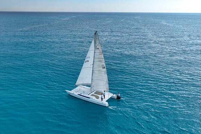 2 in 1 Catamaran to Isla Mujeres Tour from Cancun with Open Bar - Open Bar on the Water: What Unlimited Drinks Really Changes