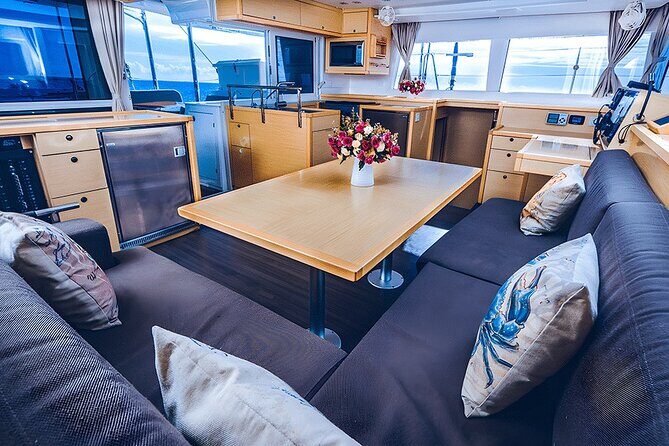 3 Hours Exclusive 45' Lagoon Catamaran Experience - Puerto Aventuras lagoon time: paddle boards, floating mat, and sea life