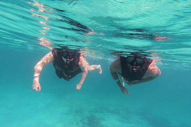 3 in 1 Private Tour Tulum Cenote and Snorkeling in the reef - Entering Tulum: ruins, Caribbean views, and a useful free hour