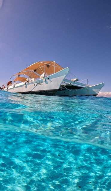 4 Hour Turtle Sanctuary Experience on a Luxury Catamarán - Cielito Little Heaven Sandbank: Snacks, Clear Water, and Sunset Return