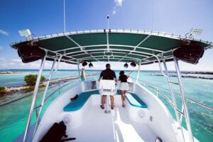 4 Hours - 53' Hatteras - Tulum, Playa Del Carmen, Riviera Maya - Entering the vibe: Dos Piratas, music, and karaoke on deck