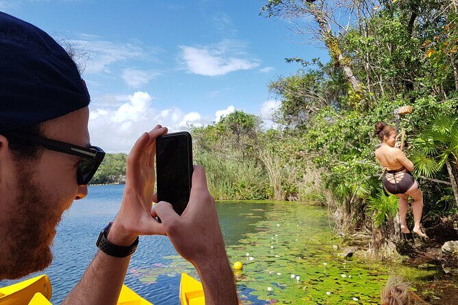 4 Private Cenotes, Zip-Lines, Canoes & Mayan Village with Delicious Lunch - Cenotes and snorkel time: warm water, open sinkholes, and the mosquito reality