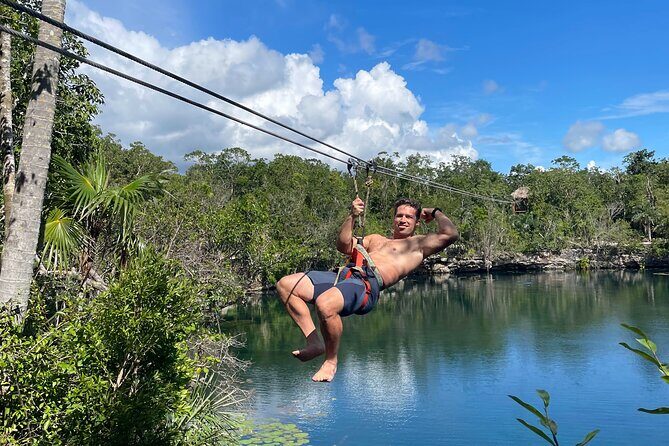 4 Private Cenotes, Zip-Lines, Canoes & Mayan Village with Delicious Lunch - Zip-lines in the jungle: views, speed, and safety with a local guide