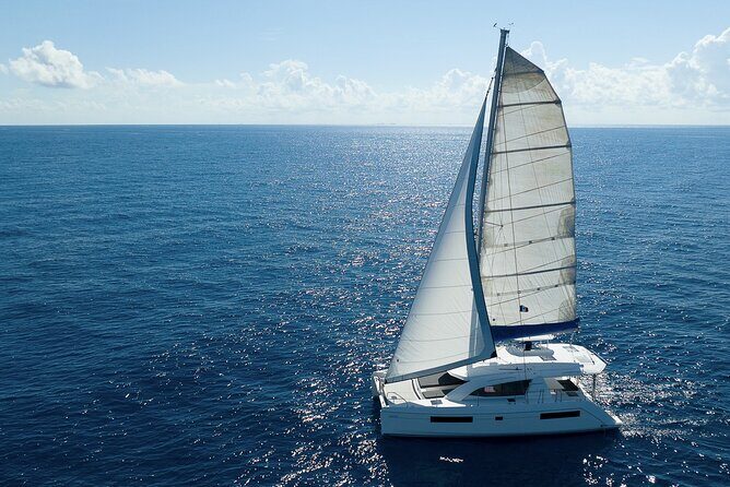 5-Hour 38'Luxury Catamaran All-Inclusive Tulum & Playa del Carmen - La Bocana shallow stop with music and easy swimming