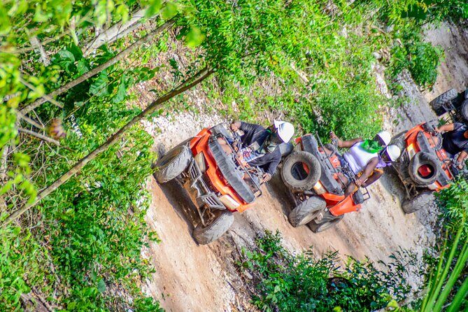 Action-packed Cancun ATV tour, Ziplines, Cenote, Lunch and More - Zipline through the trees: short, fun, and still safety-first