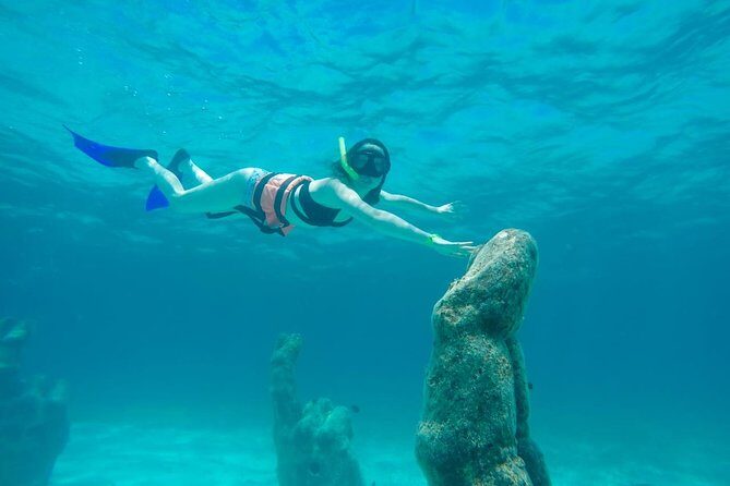 Afternoon Half-Day Catmaran Sailing and Snorkel Adventure - Snorkeling near Isla Mujeres: what’s included, what can limit you, and how to enjoy it anyway