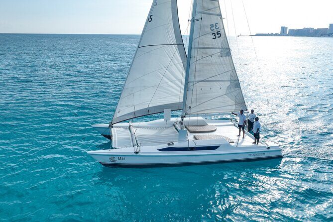 All-Inclusive Isla Mujeres Catamaran with Free Transportation - El Meco Reef snorkeling: free gear and a guided plan for underwater sculptures
