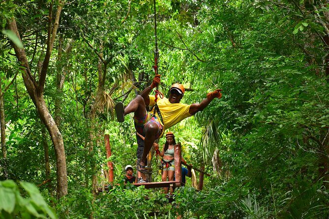 ATV Tour with Cenote swim, Ziplines, Transportation and Lunch Included - Ziplining over the canopy: high safety standards, plus the rush factor