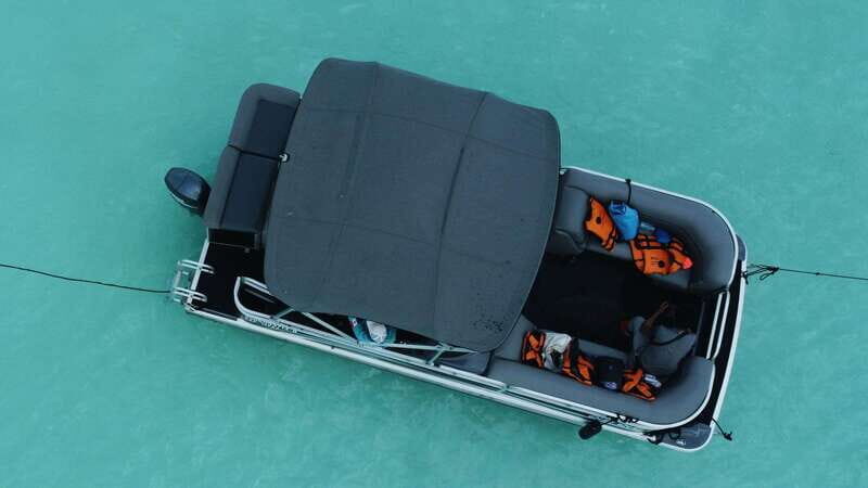 Bacalar: 3-hr Pontoon Boat Tour with Beach Club + Kayaks - Cenote stops: quick guided time plus real water time