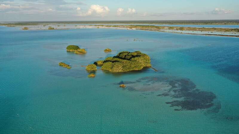Bacalar: Group Sailing Trip with Swimming and Drinks - Weather Rules: Rain or Shine, So Dress Like a Pro