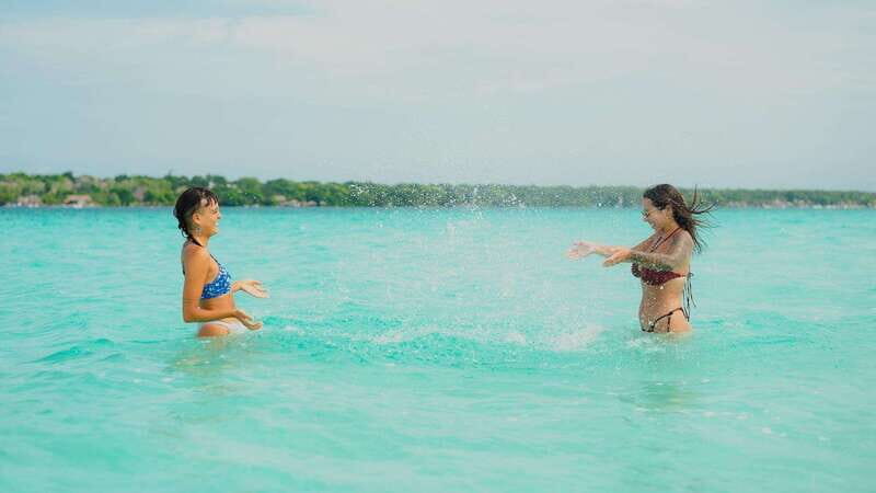 Bacalar Lagoon Sightseeing Boat Tour with Open Bar & Snack - The secret stop: picnic, free time, and sunset vibes