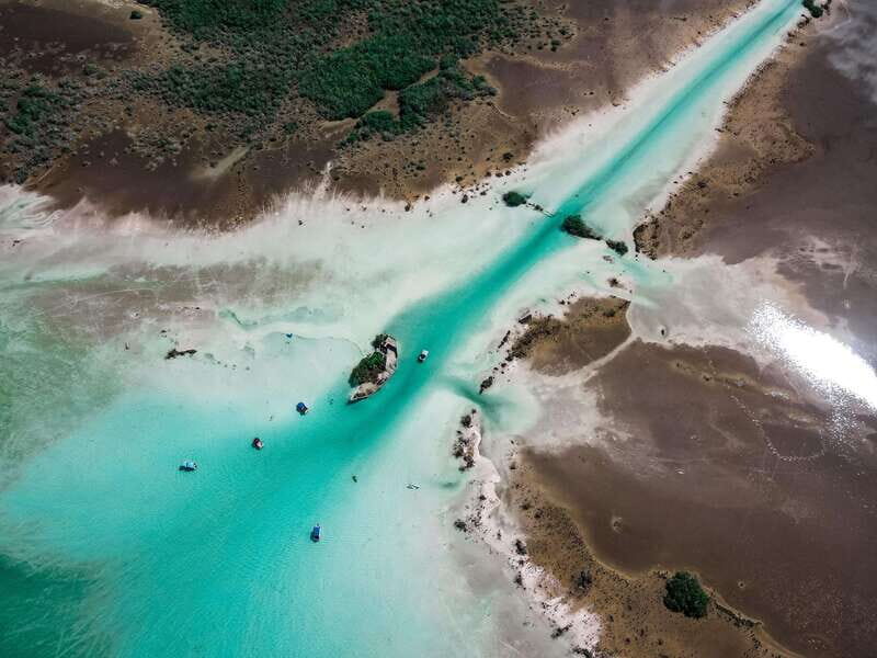 Bacalar: Lake of Seven Colors Pontoon Tour with Fruit - Pirate Channel and Island of Birds: The Lagoon’s Signature Stops