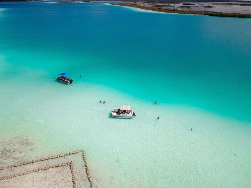 Bacalar: Lake of Seven Colors Pontoon Tour with Fruit - Swim Time: Cooling Off in Clear, Shallow Water