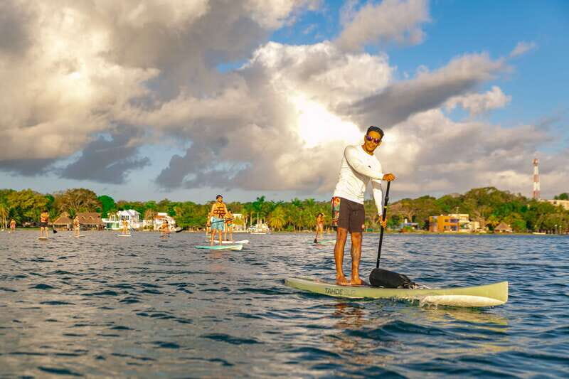 Bacalar: Sunrise Paddleboard Tour with Floating Picnic - Floating breakfast on the lagoon: fruit, juices, and a coffee-style reset