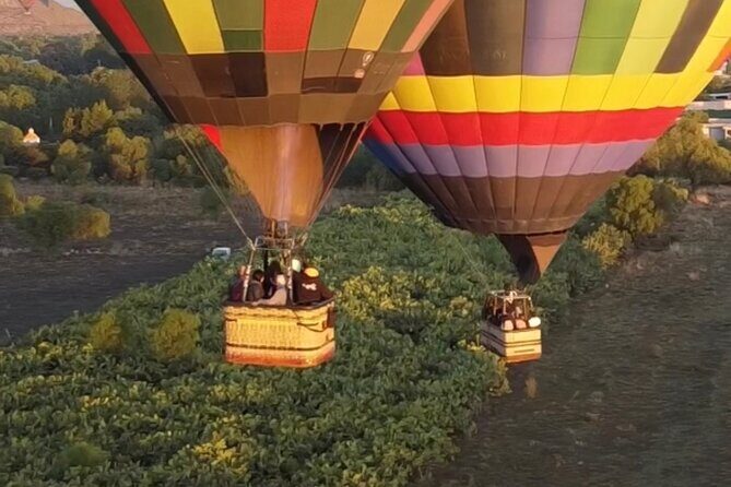 Balloon flight + pick up in CDMX + Breakfast in Cave + Pyramids - The Landing Ceremony: Toasts and Flight Certificates