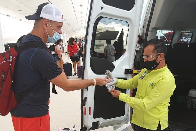 Black Luxury Van WiFi arrivals aboard from Cancun Airport - Van Comfort: Wi‑Fi, Air Conditioning, Water, and Towels