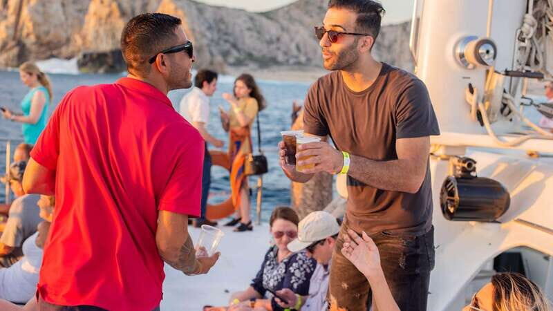 Cabo San Lucas: 2 Hour Sunset Cruise with Food and Wine - Getting On: Pickup Around Cabo and the Catamaran Setup