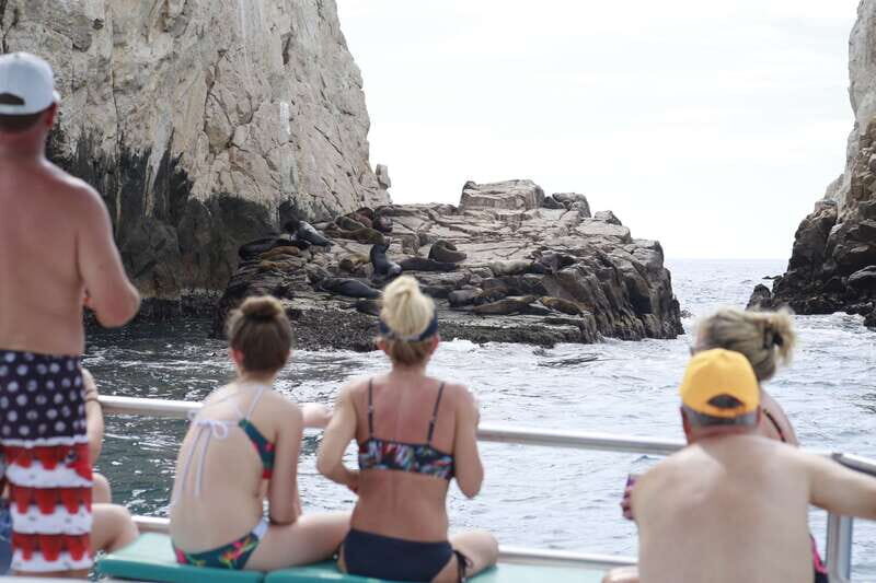 Cabo San Lucas Private Mini Catamaran Tour - Stand-Up Paddle Board and the MP3 Music System