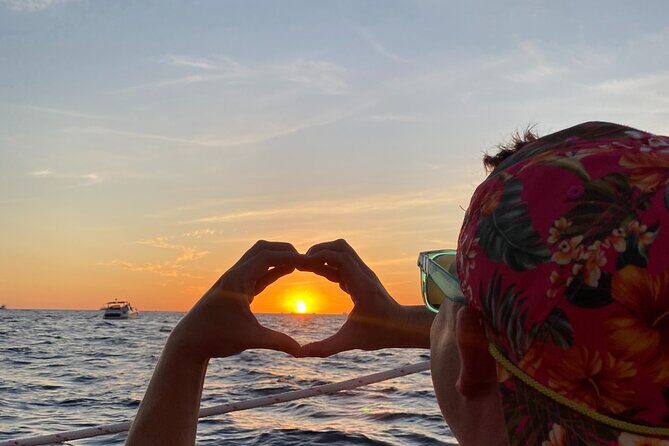 Cabo San Lucas Sunset Cruise with Open Bar and Snacks - The Sunset Over the Pacific and the Photo-Friendly 360 Turn