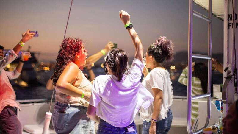 Cabo San Lucas: Sunset Party Cruise with Open Bar - What Happens On Board: Open Bar, Club Hits, and Host Energy