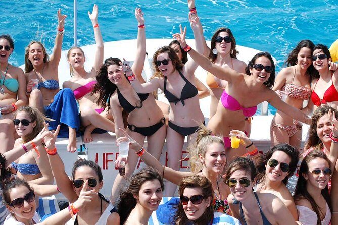 Cancun Adults Only Party Cruise to Isla Mujeres with Open Bar - Open bar and party energy on the catamaran deck
