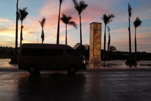 Cancun Airport Transfers - Private Van ROUND TRIP - Finding the Driver at Cancun Airport: Banner Sign and Phone-On Timing