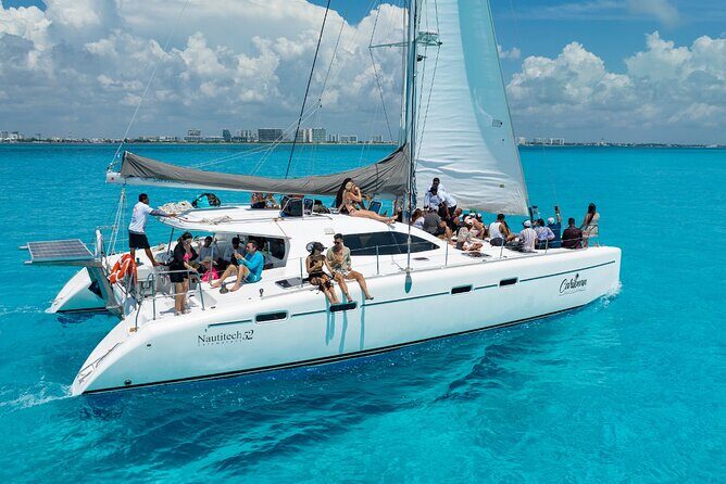 Cancun Catamaran: Isla Mujeres, Snorkeling, Drinks & Buffet Lunch - Getting on Board at Playa Tortugas Marina (and Why Timing Matters)