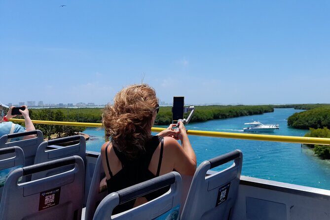 Cancun City Sightseeing and Shopping Tour on a Double Decker bus - Boulevard Kukulcán Views: Hotels, Clubs, and Marinas From the Road
