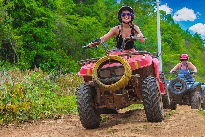 Cancun Combo Tour: ATV and Zip- lines with Cenote Swim - Cenote Lukama swim: jumping into bright green water