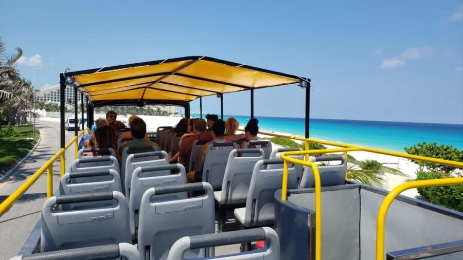 Cancun: Guided City Tour with Shopping by Double Decker Bus - Beer, Water, and Entrance Fees: Why the $60 Price Can Make Sense