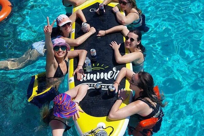 Cancun to Isla Mujeres Private Catamaran Cruising Snorkeling Fun! - Sailing toward Isla Mujeres: open bar rhythm and Caribbean music (1 hour)