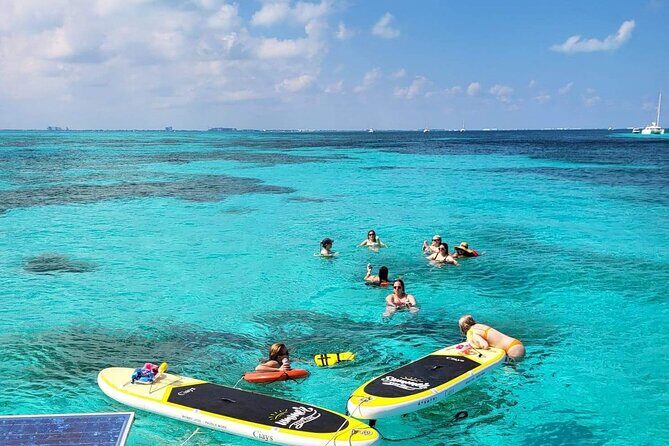 Cancun to Isla Mujeres Private Catamaran Cruising Snorkeling Fun! - Playa Norte beach club: rooftop lunch and one hour to wander (about 2 hours total)
