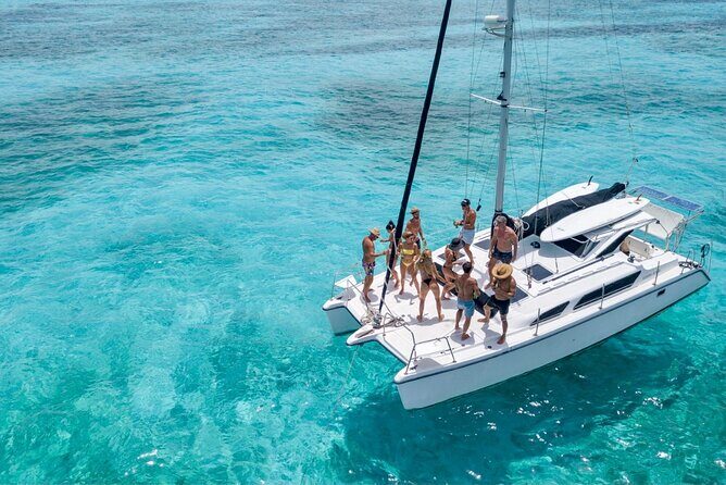 Cancun to Isla Mujeres Private Catamaran Cruising Snorkeling Fun! - Stop 1 in Cancun: check-in, then it’s water time