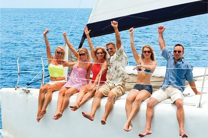 Cancun's Best: Catamaran to Isla Mujeres, Snorkeling & Drinks! - Return to Cancún: One Last Cruise Moment