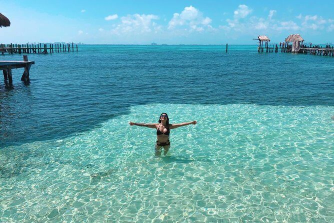 Catamaran Sailing to Isla Mujeres with Snorkeling, Lunch & Open Bar included - Spinnaker Over the Caribbean: Fun When Wind Shows Up