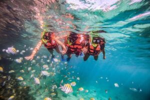 CATAMARAN to Isla Mujeres, Snorkel & Beach Club by Xcaret - El Meco Reef Snorkeling: Where the Water Time Counts