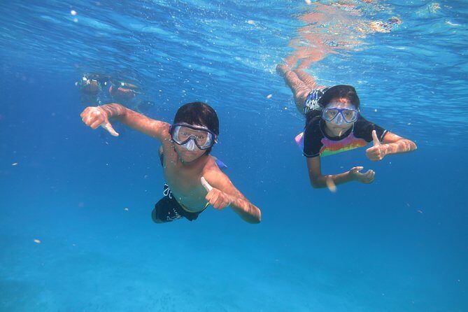 Catamaran Tour to Isla Mujeres all Included - Maya Reef Snorkeling: Clear Water, Real Currents