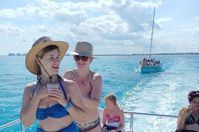 Catamaran Tour to Isla Mujeres all Included - Drinks, Music, and the On-Board Crowd Vibe