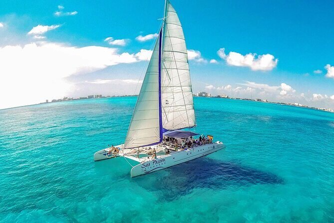 Catamaran Tour to Isla Mujeres from Cancún with Bar and Lunch - Spinnaker Time and Open Bar on the Water