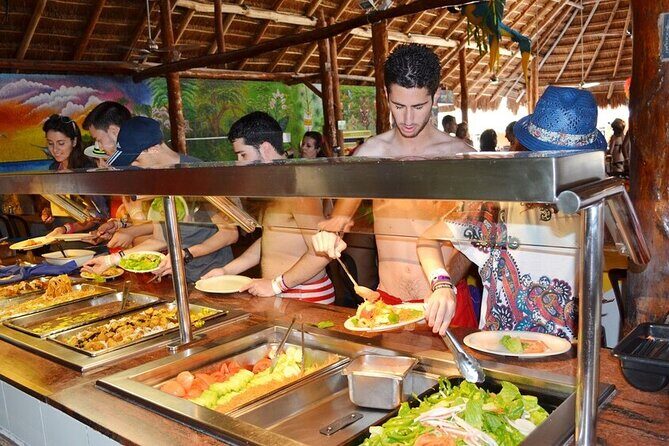 Catamaran Tour to Isla Mujeres from Cancún with Bar and Lunch - Exploring Isla Mujeres Town at Your Own Pace