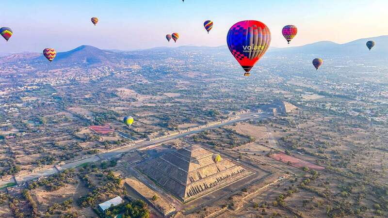 CDMX: Teotihuacan Balloon Flight with Optional Pyramids Tour - The balloon landing: toast, certificate, and the first Teotihuacan moments