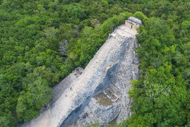 Coba & Mayan Cenote tour with lunch from Cancun and Riviera Maya - Entering Cobá: temples, ball courts, and the 120 steps of Nohoch Mul