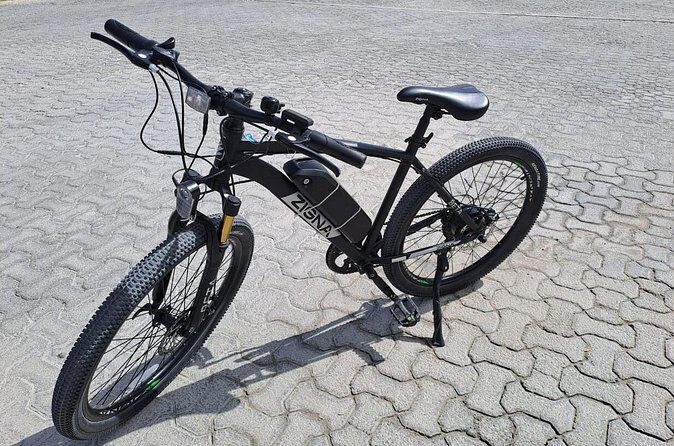 Costa Maya E-Bikes Rental - Road reality check: potholes, speed bumps, and safety moments