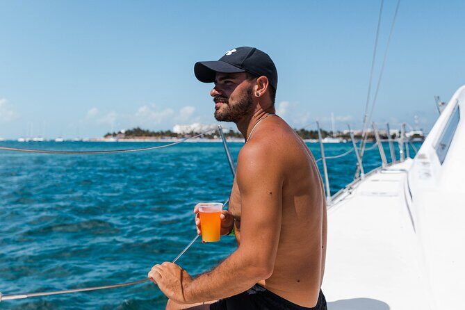 Deluxe Catamaran Tour to Isla Mujeres, Drinks, Snorkeling, Buffet - Beach Club Time and Mexican Buffet: Where the Day Winds Down