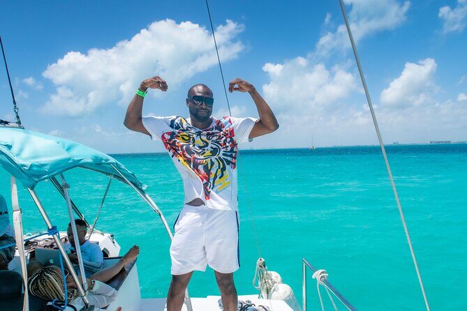 Deluxe Catamaran Tour to Isla Mujeres, Drinks, Snorkeling, Buffet - On Board the Catamaran: Music, Unlimited Drinks, and Seating Reality