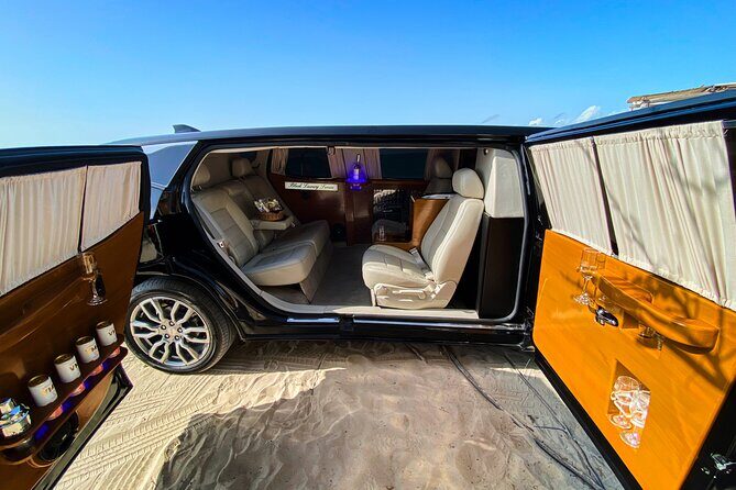 Deluxe GMC Limousine from Cancun Airport to Puerto Morelos - Cancun Airport Pickup: How to Find Your Driver Without Getting Caught in the Noise