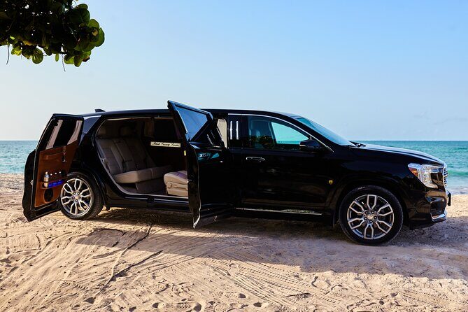 Deluxe GMC Limousine from CUN Airport to Playa Mujeres - Entertainment, music, and the one thing to ask before you roll