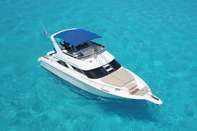 Deluxe Yacht 48FT with FlyBrige Rental in Cancun - Bay of Cancun Swim Time: Turquoise Water If Weather Plays Nice