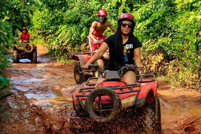 Drive an Atv shared, swim in a Cenote and ziplines in the Cancun - Zip lines in Cancun: what the safety setup and course feel like